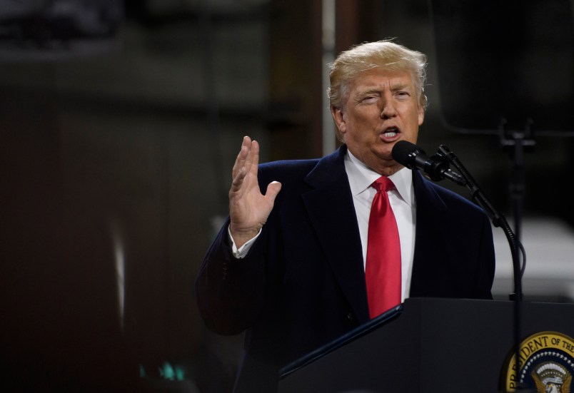 CORAOPOLIS, PA - JANUARY 18: President Donald Trump speaks to supporters at a rally at H&K Equipment, a rental and sales company for specialized material handling solutions on January 18, 2018 in Coraopolis, Pennsylvania. Trump visited the facility for a factory tour and to offer remarks to supporters and employees following the administration's new tax plan. (Photo by Jeff Swensen/Getty Images)