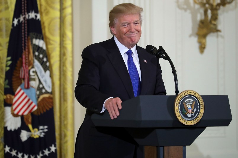 U.S. President Donald Trump hosts a working session with mayors in the East Room of the White House January 24, 2018 in Washington, DC. According to U.S. Conference of Mayors President Mitch Landrieu, representatives from the conference were scheduled to meet with Trump but cancelled due to the administration's 'decision to threaten mayors and demonize immigrants.' The conference, a non-partisan organization of cities with a population of 30,000 or larger, is holding its annual meeting this week in Washington.