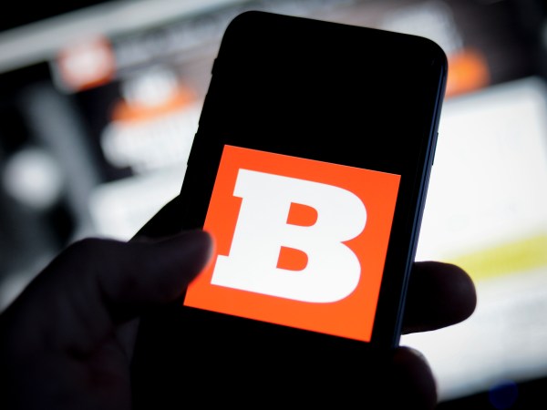 The Breitbart logo is seen on an iPhone with the Breitbart website in the background in this photo illustration on November 20, 2017. (Photo by Jaap Arriens/NurPhoto)