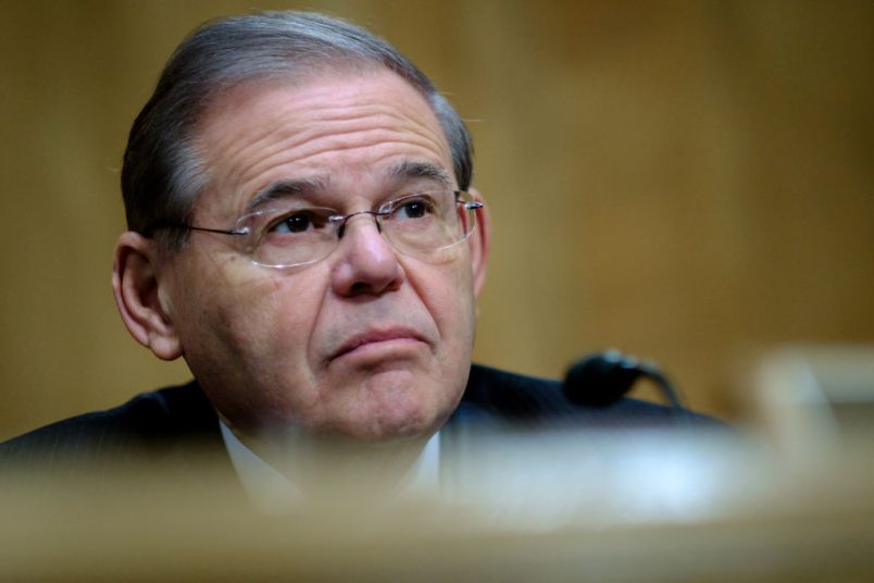 WASHINGTON, DC - JANUARY 30:  Senator Bob Menendez (D-NJ) looks on as Treasury Secretary Steven Mnuchin delivers the annual financial stability report to the Senate Banking, Housing and Urban Affairs Committee on January 30, 2018 in Washington, DC. Mnuchin said the Treasury can extend the government's debt limit suspension period into February before it exhausts its borrowing ability.  (Photo by Pete Marovich/Getty Images)