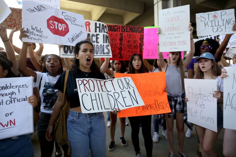 Victoria Mejiar, a sophomore at South Broward High School attends a rally at the Federal Courthouse in Fort Lauderdale, Fla., to demand government action on firearms, on Saturday, Feb. 17, 2018. Their call to action is a response the massacre at Marjory Stoneman Douglas High School in Parkland, Fla. (Mike Stocker/Sun Sentinel/TNS)