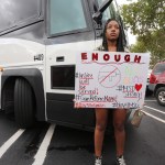 A Stoneman Douglas student waits to board buses to Tallahassee, Fla., heading to the Florida Capitol to advocate for gun control on Tuesday, February 20, 2018. (Emily Michot/Miami Herald/TNS)