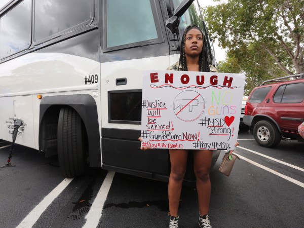 A Stoneman Douglas student waits to board buses to Tallahassee, Fla., heading to the Florida Capitol to advocate for gun control on Tuesday, February 20, 2018. (Emily Michot/Miami Herald/TNS)