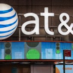NEW YORK CITY, NEW YORK, UNITED STATES - 2015/10/17: AT&T office New York City, USA: Signage and logo outside its office glowing at night.AT&T Inc. is an American multinational telecommunications corporation, headquartered at Whitacre Tower in downtown Dallas, Texas. (Photo by Roberto Machado Noa/LightRocket via Getty Images)