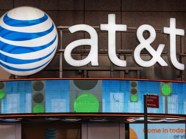 NEW YORK CITY, NEW YORK, UNITED STATES - 2015/10/17: AT&T office New York City, USA: Signage and logo outside its office glowing at night.AT&T Inc. is an American multinational telecommunications corporation, headquartered at Whitacre Tower in downtown Dallas, Texas. (Photo by Roberto Machado Noa/LightRocket via Getty Images)