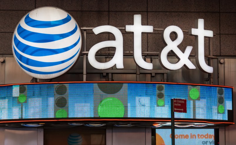 NEW YORK CITY, NEW YORK, UNITED STATES - 2015/10/17: AT&T office New York City, USA: Signage and logo outside its office glowing at night.AT&T Inc. is an American multinational telecommunications corporation, headquartered at Whitacre Tower in downtown Dallas, Texas. (Photo by Roberto Machado Noa/LightRocket via Getty Images)