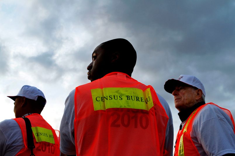Baylen, Liz –– – LOS ANGELES, CA – MARCH 30, 2010 (Middle) Shamar Drew, 30, of LA, and (right) David Brown, 67, of LA, say working as enumerators for the Census is something fun to do and it also allows them to make a little extra money. They are among many Census workers, who picked up materials at Dodger Stadium before heading out to count the number of homeless people, March 30, 2010, in Los Angeles. ( Liz O. Baylen / Los Angeles Times )