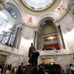 FRANKFORT, KY-AUGUST 30: African-American groups hold a rally at the Kentucky State Capitol building to urge Kentucky Governor Matt Bevin to remove a statue of Confederate President Jefferson Davis from the State Capitol rotunda August 30, 2017 in Frankfort Kentucky.  (Photo by Bill Pugliano/Getty Images)