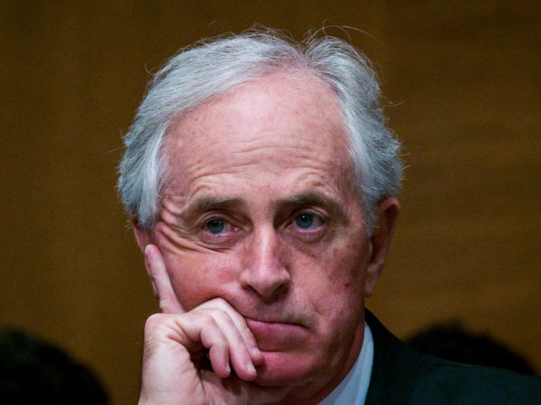 WASHINGTON, DC - JANUARY 30:  Senator Bob Corker (R-TN) looks on as Treasury Secretary Steven Mnuchin delivers the annual financial stability report to the Senate Banking, Housing and Urban Affairs Committee on January 30, 2018 in Washington, DC. Mnuchin said the Treasury can extend the government's debt limit suspension period into February before it exhausts its borrowing ability.  (Photo by Pete Marovich/Getty Images)