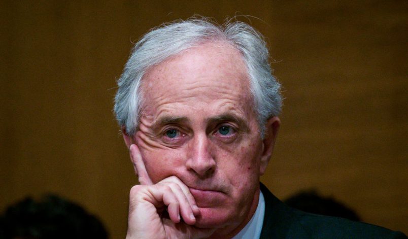 WASHINGTON, DC - JANUARY 30:  Senator Bob Corker (R-TN) looks on as Treasury Secretary Steven Mnuchin delivers the annual financial stability report to the Senate Banking, Housing and Urban Affairs Committee on January 30, 2018 in Washington, DC. Mnuchin said the Treasury can extend the government's debt limit suspension period into February before it exhausts its borrowing ability.  (Photo by Pete Marovich/Getty Images)