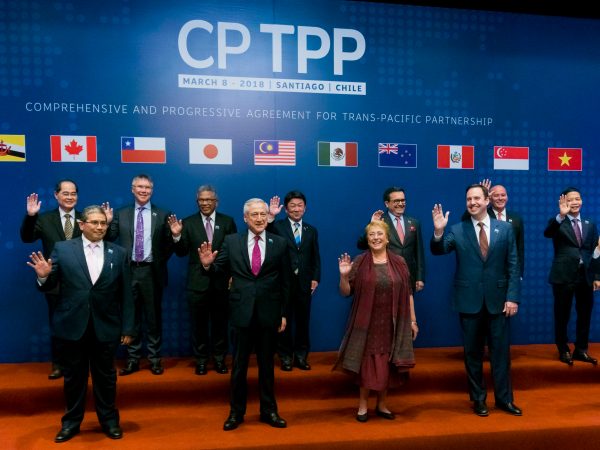 SANTIAGO, CHILE – MARCH 08: President of Chile, Michelle Bachelet (C) poses for photos with the 11 representatives that signed the Integral and Progressive Treaty of Trans-Pacific Partnership - CPTP, on March 08, 2018 in Santiago, Chile. (Photo by Sebastián Vivallo Oñate/Agencia Makro/Getty Images)