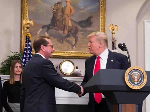 U.S. President Donald J. Trump greets  Alex Azar at his swearing-in ceremony to be Secretary of the Department of Health and Human Services at The White House in Washington, DC, January  29, 2018. Credit: Chris Kleponis / Polaris