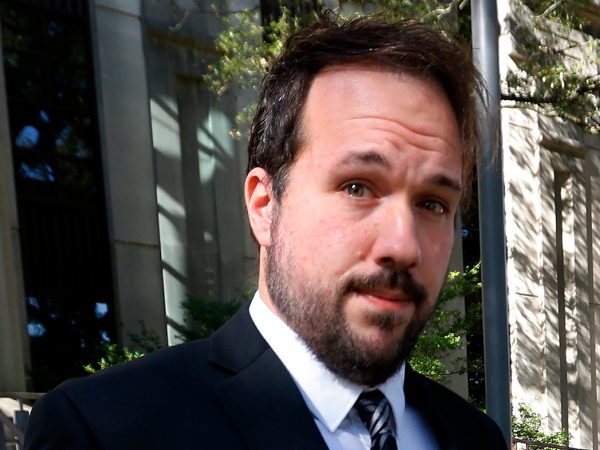 Jordan Hamlett leaves federal court following his guilty plea in Baton Rouge, La., Monday, Dec. 11, 2017. The Louisiana private investigator pleaded guilty in his  attempts to access Donald Trump's tax returns during the presidential campaign. Authorities have said Hamlett failed in his attempts to get Trump's tax returns through a U.S. Department of Education financial aid website. The 32-year-old Lafayette resident was charged with misusing a Social Security number. His trial had been scheduled to start this week, but the judge originally assigned to the case died Saturday. (AP Photo/Gerald Herbert)