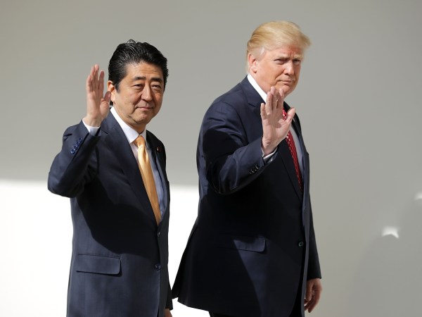 (AFP OUT) U.S. President Donald Trump and Japanese Prime Minister Shinzo Abe pose for photographs before bilateral meetings in the Oval Office at the White House February 10, 2017 in Washington, DC. Trump and Abe are expected to discuss many issues, including trade and security ties and will hold a joint press confrence later in the day.