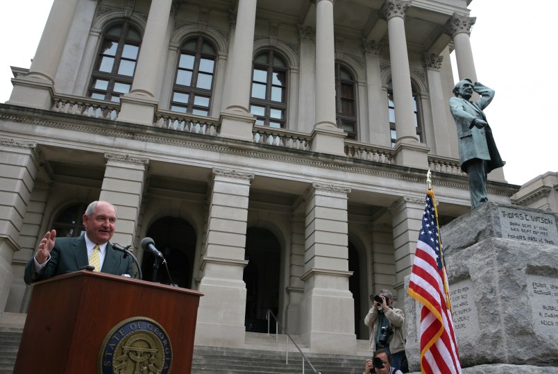 ATLANTA - NOVEMBER 13:  In the midst of a severe drought, Georgia Governor Sonny Perdue leads prayer service for rain on the steps of the Georgia State Capitol in Atlanta, Ga., on November 13, 2007.  Georgia citizens, politicians and religious leaders were invited to the public prayer service to pray for relief to Georgia's drought.  (Photo by Jessica McGowan/Getty Images)