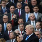 U.S. President Donald Trump hosts an event to celebrate Congress passing the Tax Cuts and Jobs Act with Republican members of the House and Senate on the South Lawn of the White House December 20, 2017 in Washington, DC. The tax bill is the first major legislative victory for the GOP-controlled Congress and Trump since he took office almost one year ago.