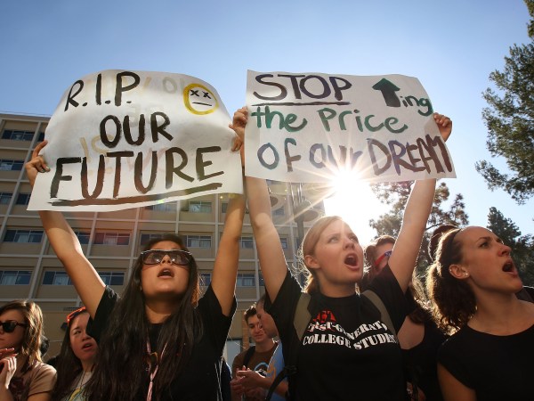 LOS ANGELES, CA - NOVEMBER 19:  University of California Los Angeles (UCLA) students and supporters protest as the UC Board of Regents meets to vote on a 32 percent tuition hike next year on November 19, 2009 in Los Angeles, California. Undergraduate fees for students at the California university system would be paying about $2,500 more. It is the second day that demonstrators, including students from other UC campuses, have gather to try to dissuade the board from approving the proposed increase. Massive cuts to balance the state budget have squeezed education funds in California.   (Photo by David McNew/Getty Images)