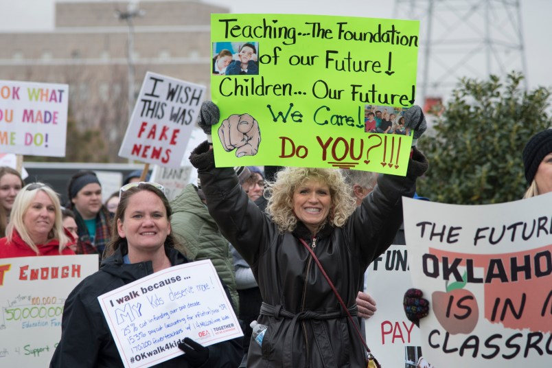 OKLAHOMA CITY, OK - APRIL 2: Oklahoma teachers rally at the state capitol in Oklahoma City, Oklahoma on April 2, 2018. Thousands of teachers and supporters are scheduled to rally Monday at the state Capitol as Oklahoma becomes the latest state to be plagued by teacher strife. Teachers are walking off the job after a $6,100 pay raise was rushed through the Legislature and signed into law by Gov. Mary Fallin. (Photo by J Pat Carter/Getty Images)