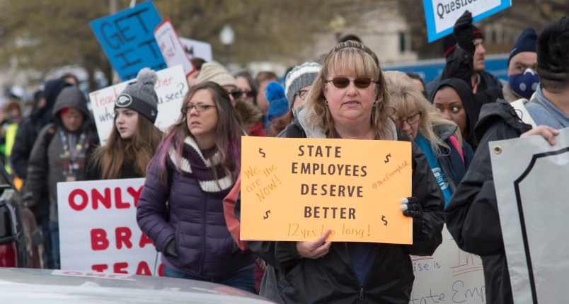 OKLAHOMA CITY, OK - APRIL 2: Oklahoma state employees joined the picket line at the state capitol in Oklahoma City, Oklahoma on April 2, 2018. Thousands of teachers and supporters are scheduled to rally Monday at the state Capitol as Oklahoma becomes the latest state to be plagued by teacher strife. Teachers are walking off the job after a $6,100 pay raise was rushed through the Legislature and signed into law by Gov. Mary Fallin. (Photo by J Pat Carter/Getty Images)