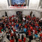 FRANKFORT, KY-APRIL 2: Public school teachers and their supporters protest against a pension reform bill in the rotunda of the Kentucky State Capital April 2, 2018 in Frankfort, Kentucky. The teachers are calling for higher wages and are demanding that Kentucky Gov. Matt Bevin veto a bill that overhauls their pension plan. (Bill Pugliano/Getty Images)
