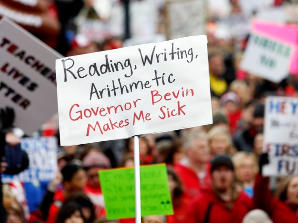 FRANKFORT, KY-APRIL 2: Thousands of public school teachers and their supporters protest against a pension reform bill at the Kentucky State Capital April 2, 2018 in Frankfort, Kentucky. The teachers are calling for higher wages and are demanding that Kentucky Gov. Matt Bevin veto a bill that overhauls their pension plan. (Bill Pugliano/Getty Images)