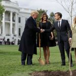 WASHINGTON, DC - APRIL 23:  U.S. President Donald Trump, U.S. first lady Melania Trump, French President Emmanuel Macron and his wife Brigitte Macron participate in a tree-planting ceremony on the South Lawn of the White House April 23, 2018 in Washington, DC. The European Sessile Oak is a gift from the Macrons and comes from Belleau Woods, where more than 9,000 American marines died in June 1918 during the First World War. According to the first lady's office "The forest is a memorial site and important symbol of the sacrifice the United States made to ensure peace and stability in Europe." (Photo by Chip Somodevilla/Getty Images)