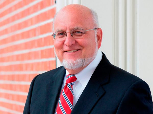 FILE - This undated photo provided by the University of Maryland School of Medicine in March 2018 shows Dr. Robert Redfield Jr. The government is paying Redfield $375,000 a year to run the Atlanta-based CDC, U.S. officials confirmed in April 2018. (Tracey Brown/University of Maryland School of Medicine via AP)