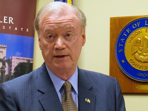 FILE-In this Wednesday, March 14, 2018 file photo, Louisiana Secretary of State Tom Schedler, accused in a lawsuit of sexually harassing one of his employees, speaks at a press conference, in Baton Rouge, La. Schedler, is leaving his elected position May 8, 2018, as calls for his resignation have increased amid allegations that the state elections chief sexually harassed one of his employees. (AP Photo/Melinda Deslatte)