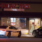 Police stand outside the Bombay Bhel restaurant in Mississauga, Ont. on Friday May 25, 2018. Fifteen people were injured Thursday night when an explosion police say was caused by an "improvised explosive device" ripped through a restaurant in Mississauga. Ontario. THE CANADIAN PRESS/Doug Ives