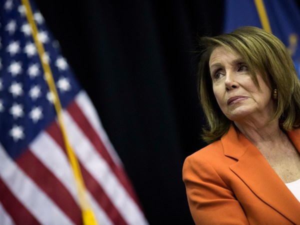 NEW YORK, NY - MAY 1: House Minority Leader Nancy Pelosi (D-CA) looks on during a bill signing event at John Jay College, May 1, 2018 in New York City. New York Governor Andrew Cuomo signed a bill ensuring domestic abusers are prohibited from possessing handguns and long guns in New York State. The bill also prohibits anyone with an outstanding warrant, felony, or other serious offenses from receiving or renewing a firearm license. (Photo by Drew Angerer/Getty Images)