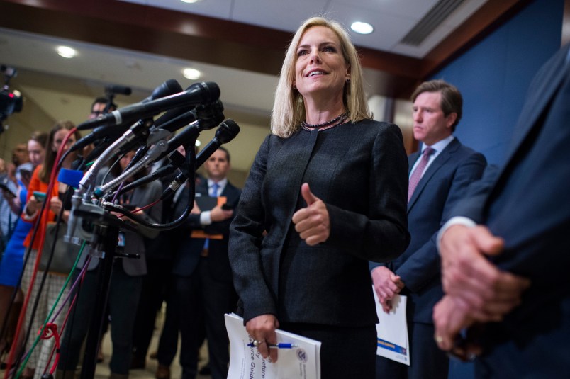 UNITED STATES - MAY 22: Homeland Security Secretary Kirstjen Nielsen, and Rep. Michael McCaul, R-Texas, chairman of the House Homeland Security Committee, off camera, address the media after briefing on election security with House members in the Capitol Visitor Center May 22, 2018. FBI Director Christopher Wray and National Intelligence Director Dan Coats also attended. (Photo By Tom Williams/CQ Roll Call)