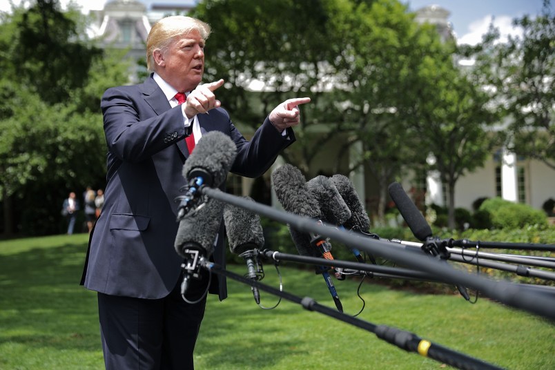 U.S. President Donald Trump talks to journalists before departing the White House May 23, 2018 in Washington, DC. Trump is traveling to New York where he will tour theÊMorrelly Homeland Security Center and then attend aÊroundtable discussion and dinner with supporters before returning to Washington.Ê