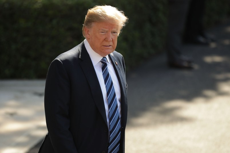 U.S. President Donald Trump talks to members of the news media before departing the White House May 25, 2018 in Washington, DC. Trump is traveling to Annapolis, Maryland, to participate in the Naval Academy's graduation ceremony.