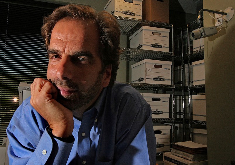 FILE - In this Friday, June 29, 2007, file photo, Dr. Steven Pitt poses in Scottsdale, Ariz. Pitt, a forensic psychiatrist, recently teamed up with the Arizona Humane Society to help the group better understand the mind-set of animal abusers. Authorities say the fatal shootings of two paralegals in a Phoenix suburb are related to the killing of a well-known forensic psychiatrist in Phoenix, and police are investigating if a fourth homicide is related. Scottsdale police Sgt. Hoster says the killings Friday of 48-year-old Veleria Sharp and 49-year-old Laura Anderson are connected to the shooting death a day earlier of Dr. Steven Pitt. The women and Pitt were killed outside their Scottsdale offices. (AP Photo/East Valley Tribune via AP, File)