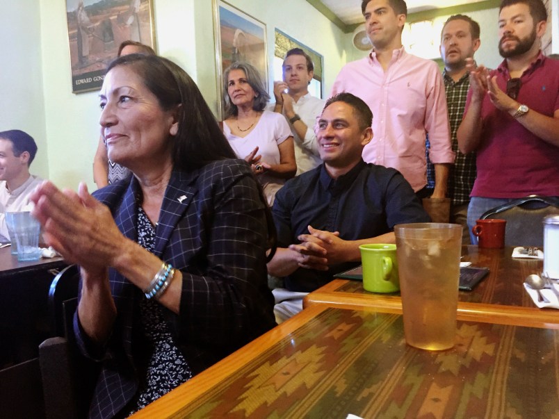 New Mexico's Democratic nominee to U.S. Congress, Debra Haaland, left, applauds at a celebratory breakfast in Albuquerque, N.M., on Wednesday, June 6, 2018, seated alongside state Sen. Howie Morales, who was nominated to run for lieutenant governor in the fall general election. Tuesday's primary elections upended the political landscape in New Mexico by setting up general-election showdowns between women in two open congressional seats and casting aside an incumbent Democratic state lawmaker who is embroiled sexual harassment accusations.(AP Photo/Morgan Lee)