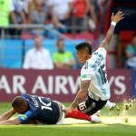 France's Kylian Mbappe, left, is fouled by Argentina's Marcos Rojo, drawing a penalty, during the round of 16 match between France and Argentina, at the 2018 soccer World Cup at the Kazan Arena in Kazan, Russia, Saturday, June 30, 2018. (AP Photo/Thanassis Stavrakis)