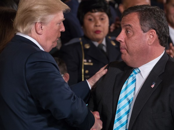 President Donald Trump shakes hands with Chris Christie, governor of New Jersey, after he signed the presidential memorandum addressing the opioid crisis, in the East Room of the White House, on Thursday October 26th, 2017. (Photo by Cheriss May/NurPhoto)