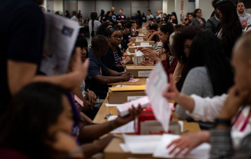 NORWALK, CA - JUNE 5,  2018:  Ballot inspectors check ballots for any damage before they are counted at the LA County Registrar-Recorder office on June 5, 2018 in Norwalk, California.(Gina Ferazzi/Los AngelesTimes)
