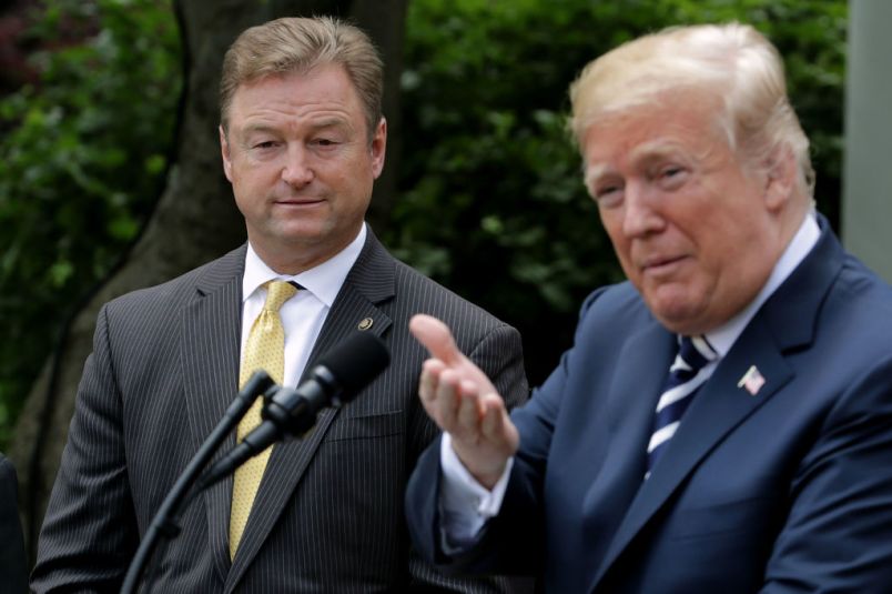 U.S. President Donald Trump delivers remarkd during a signing ceremony for the Veterans Affairs Mission Act in the Rose Garden June 6, 2018 in Washington, DC. The new law continues funding for the Veterans Choice Program for an additional year, extends comprehensive caregiver benefits to veterans injured and ill prior to September 11, 2001, and funds development of a plan to modernize the Department of Veterans Affair's health care infrastructure.