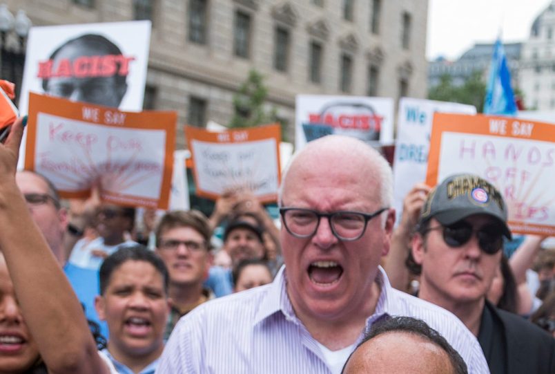 UNITED STATES - JUNE 13: From left, Reps. Jan Schakowsky, D-Ill., Joe Crowley, D-N.Y., Luis Gutierrez, R-Ill., John Cusack, Reps. Pramila Jayapal, D-Wash., John Lewis, D-Ga., Raul Grijalva, D-Ariz., Al Green, D-Texas, Judy Chu, D-Calif., and others march on 13th Street, NW, to the U.S. Customs and Border Protection in protest of the Trump Administration's policy of separating parents and children at the border on June 13, 2018. (Photo By Tom Williams/CQ Roll Call)