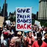 NEW YORK, June 30, 2018 -- People march across the Brooklyn Bridge during the "Families Belong Together" rally in New York, the United States, on June 30, 2018. Tens of thousands of Americans marched and rallied across the United States to protest the Trump administration's "zero tolerance" immigration policy resulting in over 2,000 children separated from their families who crossed the border illegally. (Xinhua/Li Muzi)