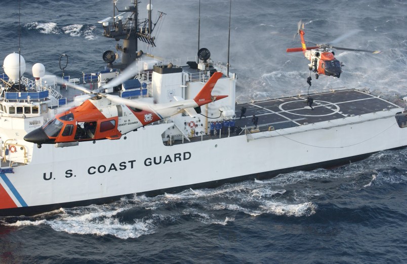 Under the watchful eye of a U.S. Coast Guard Helicopter Interceptor Squadron helo, a Coast Guard maritime security force practices fast-roping to the Coast Guard cutter Seneca's flight deck eight miles south of Rockaway, N.Y. Aug. 28, 2004. Armed U.S. Coast Guard helicopters are conducting security patrols over New York City during the Republican National Convention. USCG Photo/Mike Hvozda