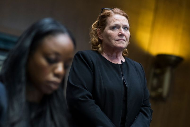 UNITED STATES - JUNE 5: Sen. Heidi Heitkamp, D-N.D., right, and Dr. Nadine Burke Harris, founder and CEO of the Center for Youth Wellness, attend a briefing in Dirksen Building on "substance use and childhood trauma," on June 5, 2018. (Photo By Tom Williams/CQ Roll Call)