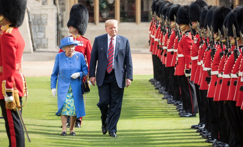 The Queen walks with President Trump as they inspect the Coldstream guards at Windsor castle.