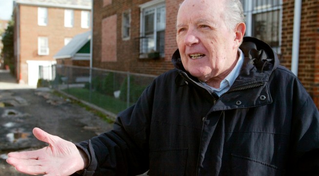 FILE - In this Nov. 20, 2003 file photo photo, Jakiw Palij stands out in front of a building in the Queens borough of New York. Palij is among at least 10 suspected Nazi war criminals ordered deported by the United States who never left the country, according to an Associated Press review of Justice Department data.  (Suzanne DeChillo/The New York Times via AP, File) - NO SALES - INTERNET OUT