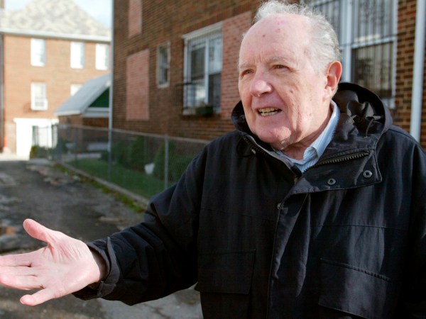 FILE - In this Nov. 20, 2003 file photo photo, Jakiw Palij stands out in front of a building in the Queens borough of New York. Palij is among at least 10 suspected Nazi war criminals ordered deported by the United States who never left the country, according to an Associated Press review of Justice Department data.  (Suzanne DeChillo/The New York Times via AP, File) - NO SALES - INTERNET OUT