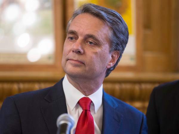 Kansas governor Jeff Colyer talks to reporters in Topeka, Kan., on Wednesday, Aug. 8, 2018, a day after his primary race against Kansas Secretary of State Kris Kobach. Colyer is currently 191 votes behind Kobach and is awaiting the results of mail-in and provisional ballots. (AP Photo/The Wichita Eagle, Travis Heying)