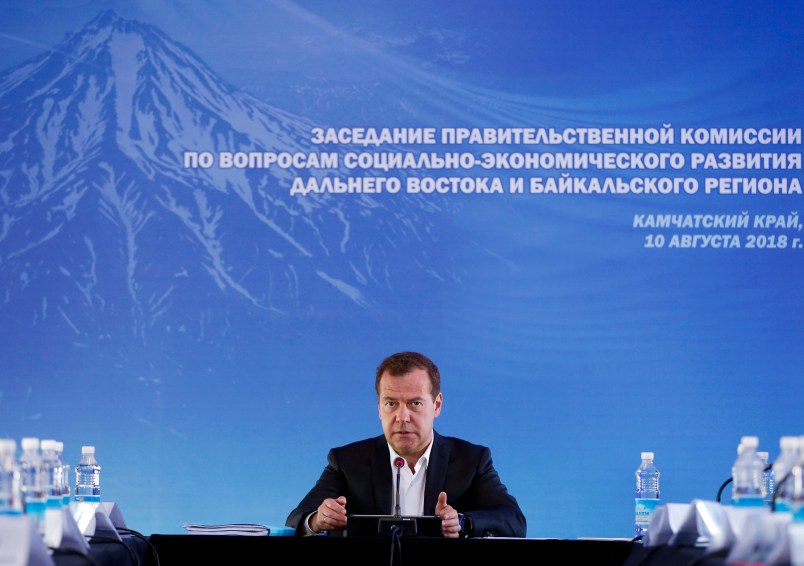 Russian Prime Minister Dmitry Medvedev speaks during a meeting in Kamchatka Peninsula region, Russian Far East, Russia, Friday, Aug. 10, 2018. Russia's prime minister sternly warned the United States on Friday against ramping up sanctions, saying that Moscow will retaliate with economic, political and unspecified "other" means. (Dmitry Astakhov, Sputnik, Government Pool Photo via AP)