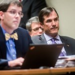 Nick Lyon, director of the Michigan Department of Health and Human Services, listens closely as Genesee District Judge David J. Goggins gives his decision during Lyon's preliminary examination on Monday, Aug. 20, 2018 at Genesee District Court in downtown Flint. Goggins bound Lyon's case over to Genesee Circuit Court for trial on two counts of involuntary manslaughter for the deaths of Robert Skidmore and John Snyder, who prosecutors say died as a result of Legionnaires' disease, and one count of misconduct in office. He also faces one misdemeanor count of willful neglect of duty. Jake May | MLive.com Jake May