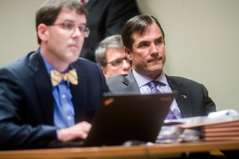 Nick Lyon, director of the Michigan Department of Health and Human Services, listens closely as Genesee District Judge David J. Goggins gives his decision during Lyon's preliminary examination on Monday, Aug. 20, 2018 at Genesee District Court in downtown Flint. Goggins bound Lyon's case over to Genesee Circuit Court for trial on two counts of involuntary manslaughter for the deaths of Robert Skidmore and John Snyder, who prosecutors say died as a result of Legionnaires' disease, and one count of misconduct in office. He also faces one misdemeanor count of willful neglect of duty. Jake May | MLive.com Jake May